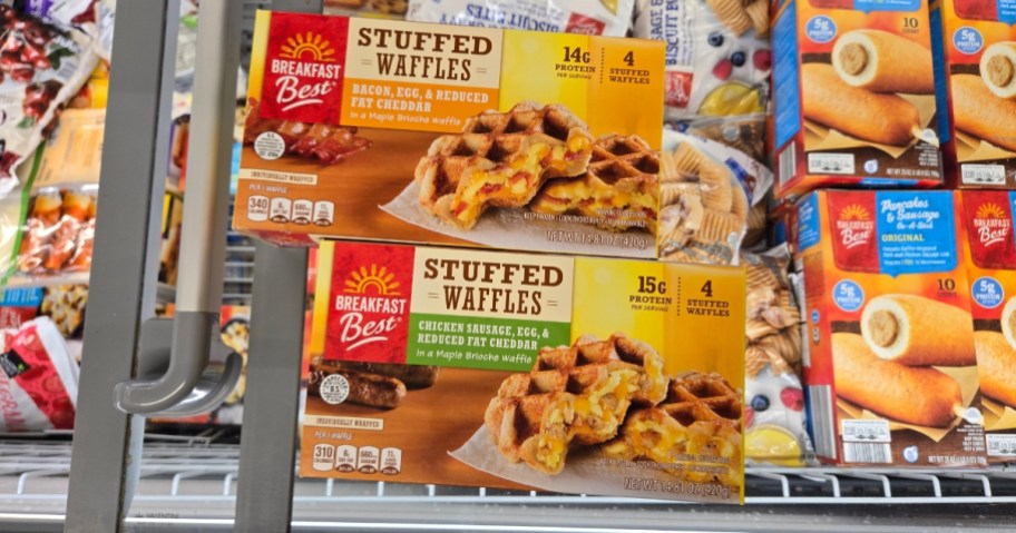 boxes of stuffed waffles in a grocery freezer section