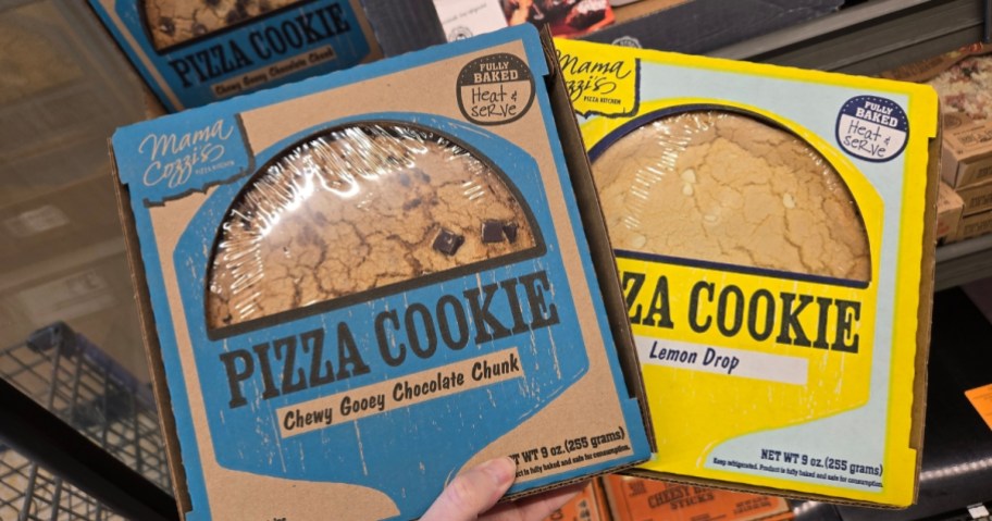 hand holding 2 Pizza Cookies in boxes