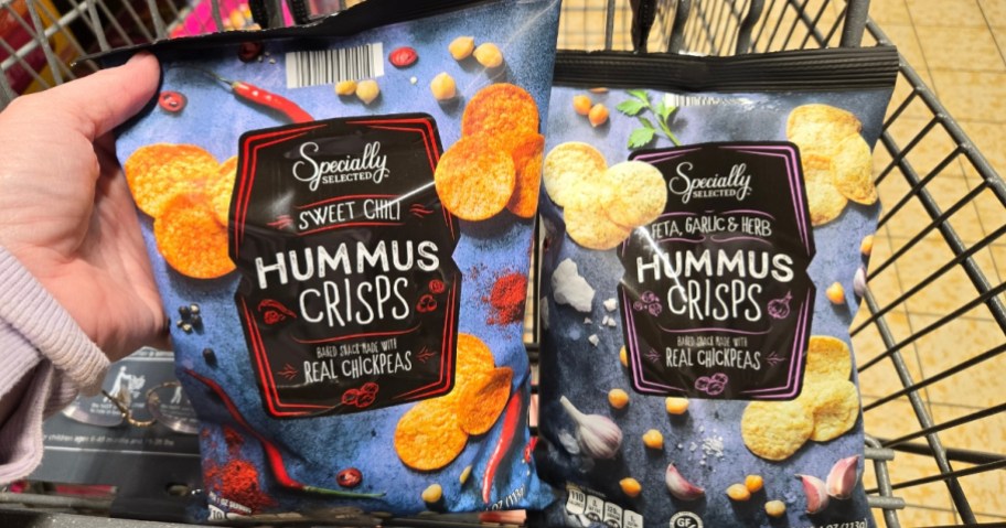2 bags of Hummus Crisps chips in an ALDI cart