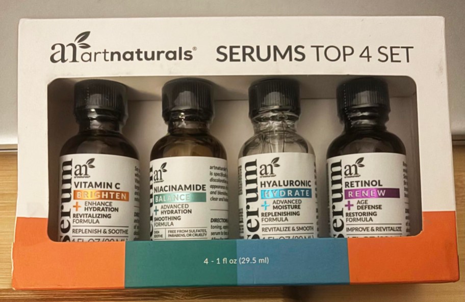 four bottles of facial serums
