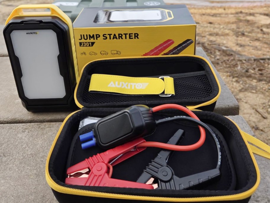 car jumper with cables in storage bag 
