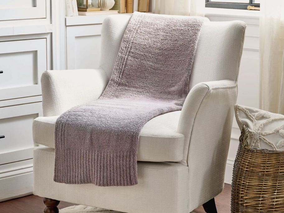 Barefoot Dreams 45" x 60" CozyChic Stacked Rib Border Blanket on chair