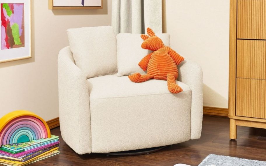 a white boucle kids swivel chair