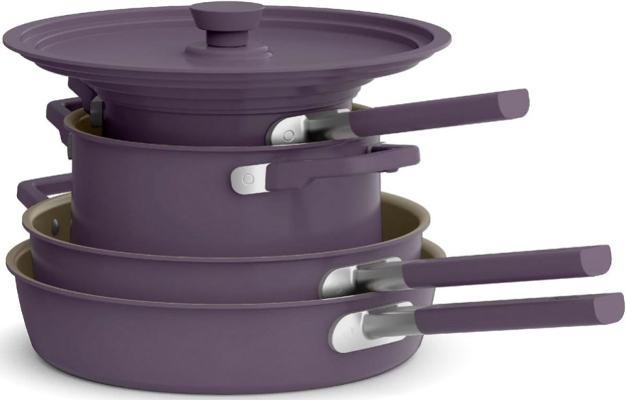 purple cookware stacked with lid on top 
