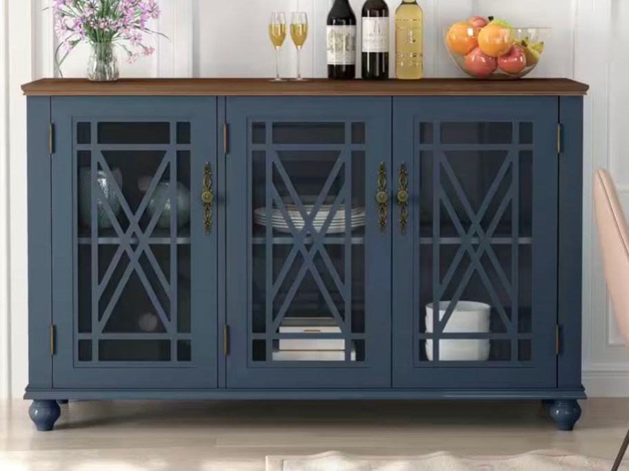 navy blue buffet table with wine on top 