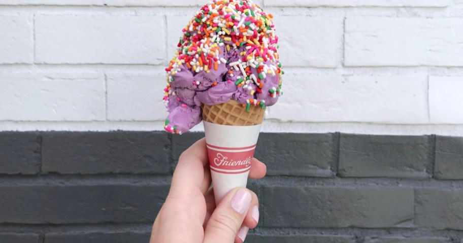 hand holding ice cream cone