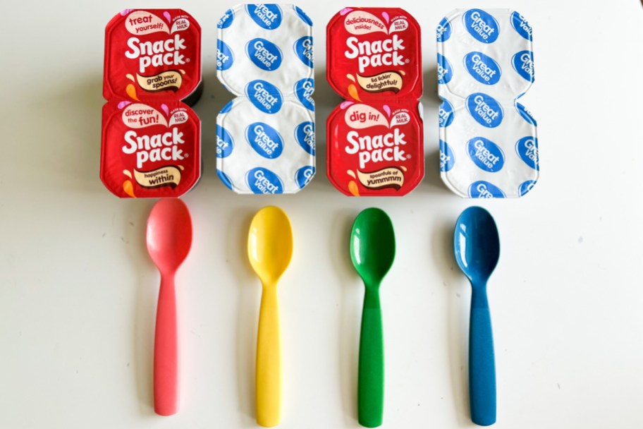 4 pudding cups w colorful spoons