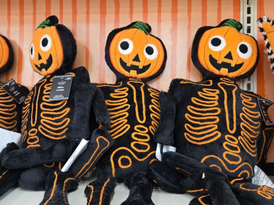 Ashland 37" Jack-O'-Lantern Skeleton Pillows on shelf in store