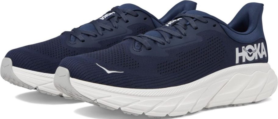 pair of navy and white hoka shoes