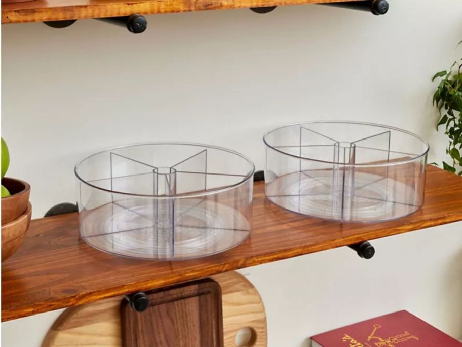 set of clear lazy susans displayed on top of the table