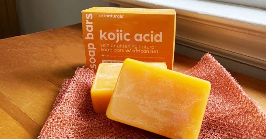 two bars of kojic acid turmeric soap with african net sponge