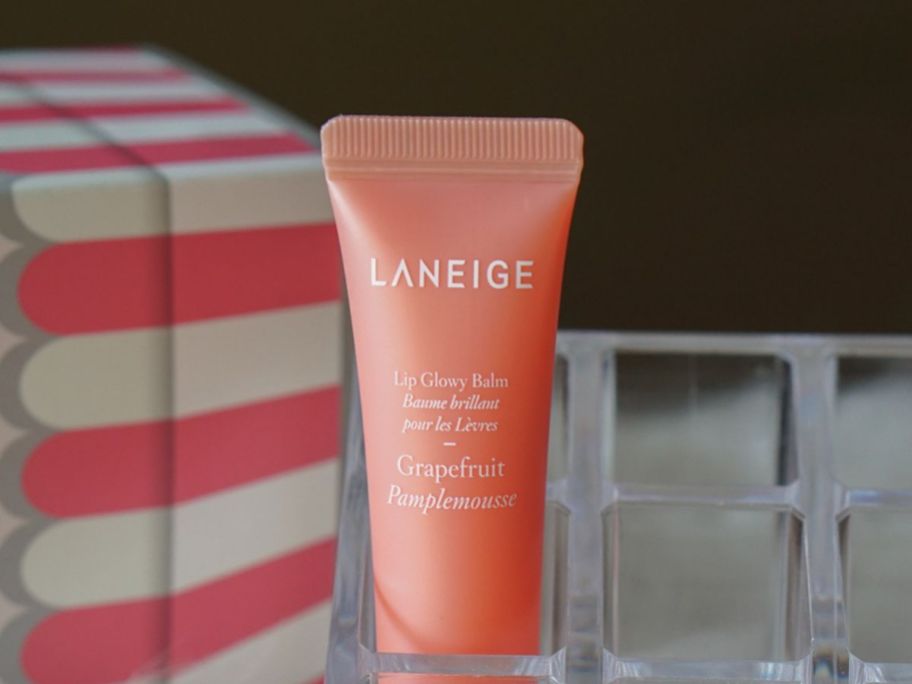 Laneige Lip Glowy Balm in Grapefruit in plastic stand