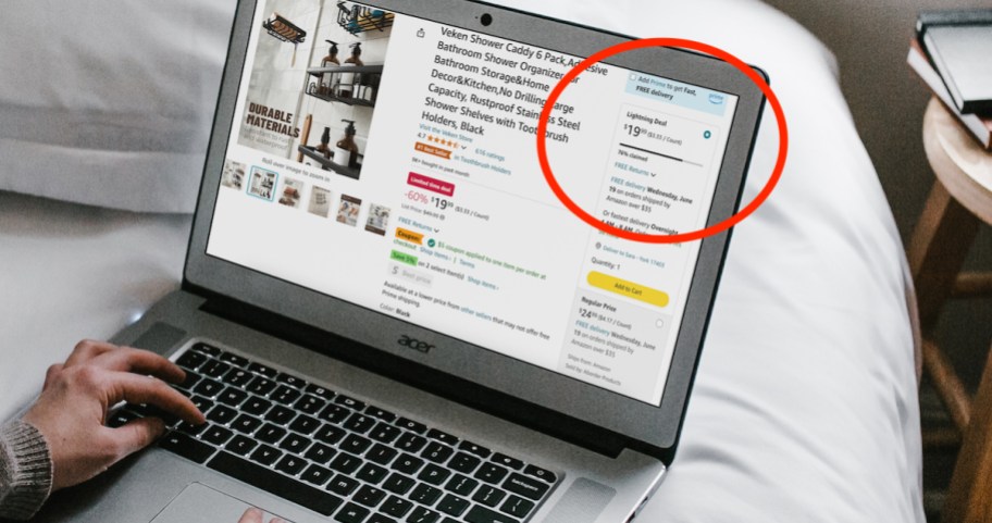 hand typing on laptop with amazon lightning deal on screen