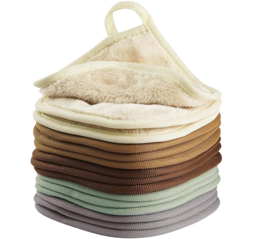 a 15 piece stack of makeup remover cloths in various colors, stacked