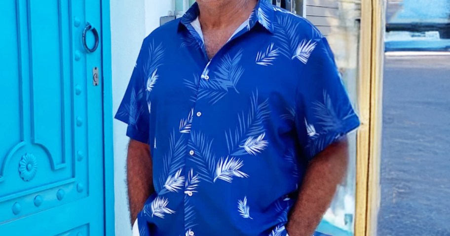 man wearing a blue hawaiian shirt