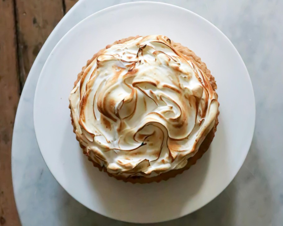 lemon meringue pie on white plate