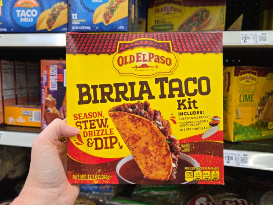 hand holding a box with an Old El Paso Birria Taco Kit 