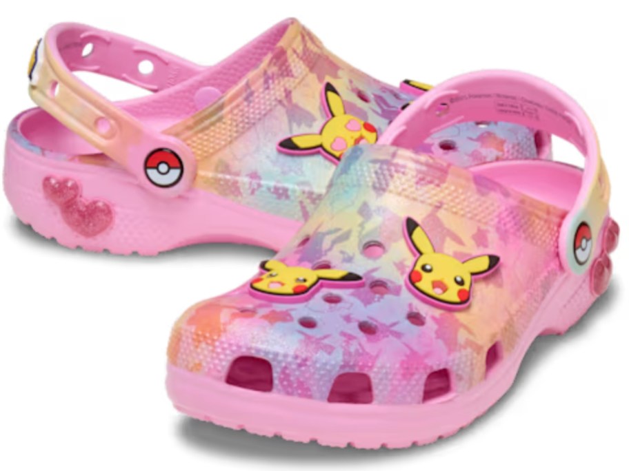 a pair of pink, purple, and yellow kids Pokemon Crocs clogs