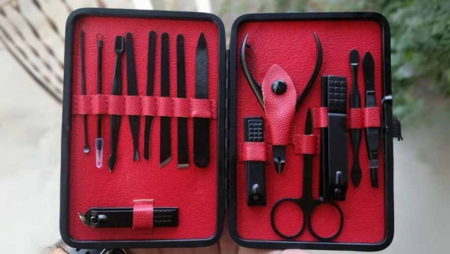 a red 15 piece nail clipper set