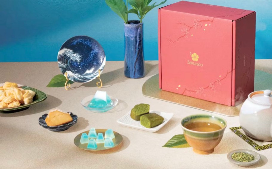 sakuraco box with treats, and teas on table