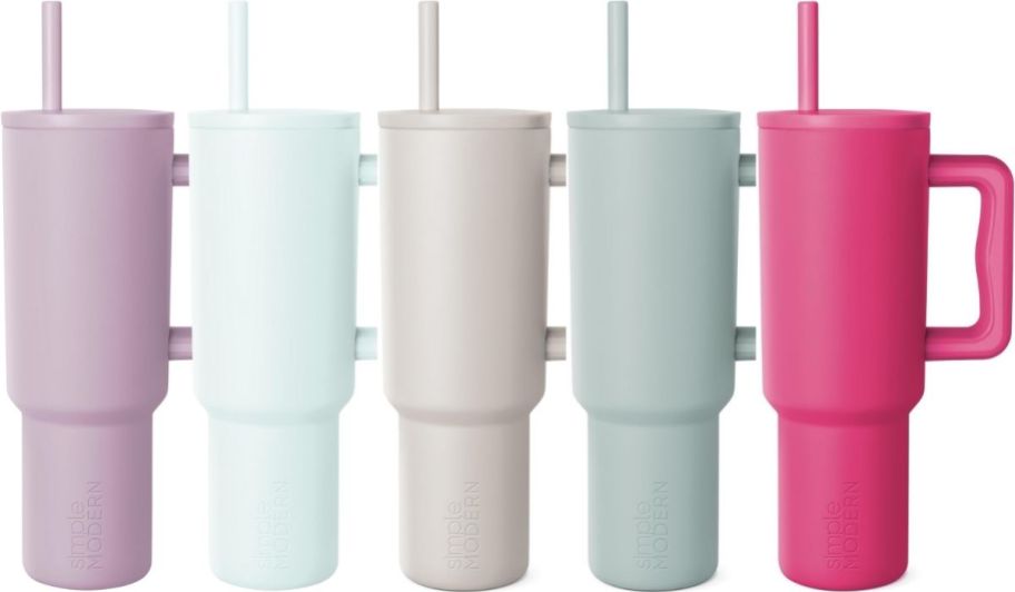 five simple modern tumblers with lids and straws in assorted colors