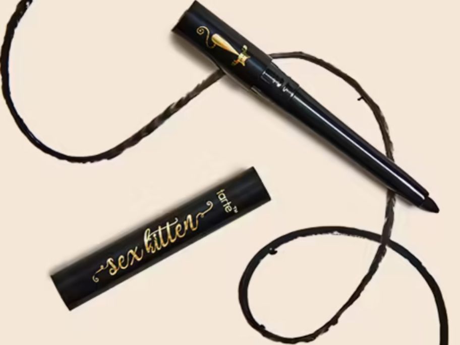 An open Tarte Sex Kitten Travel Size eye liner with a swatch of the pencil