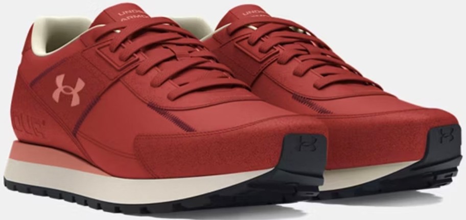 pair of red under armour shoes