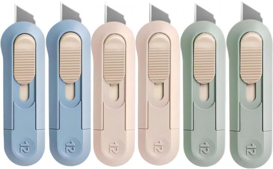 two blue, two pink, and two green utility knives