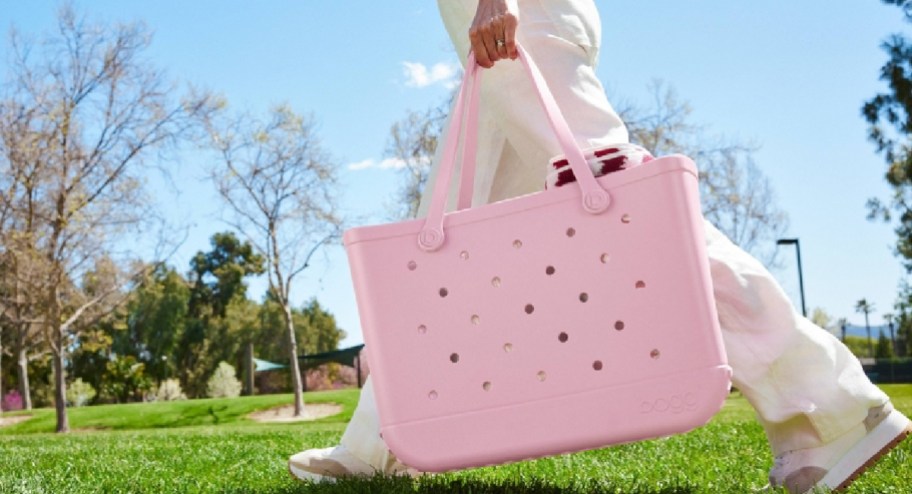 woman swinging new color target bogg bags